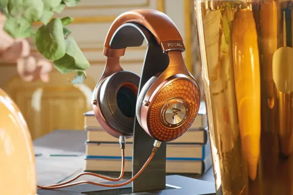 Control4 Touch panel in a able with a traditional home in the background